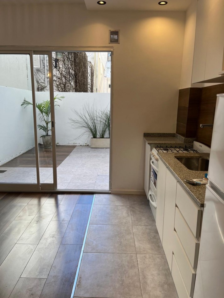 DTO UN AMBIENTE AMPLIO CON PATIO