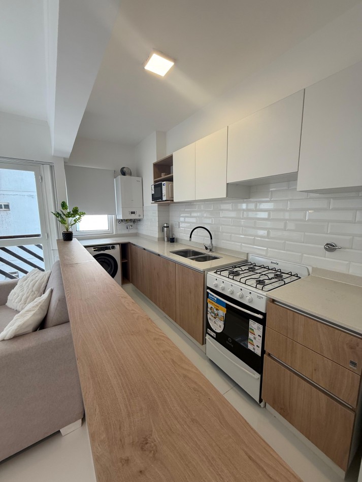 HERMOSO DEPARTAMENTO TRES AMBIENTES CON COCHERA